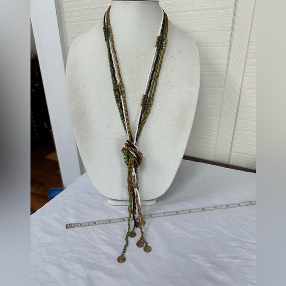 Long multi strand necklace with neutral tone beads and gold dangles - Picture 5 of 6